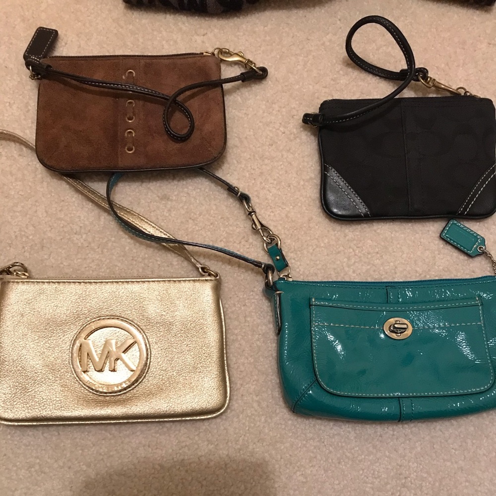 3 coach wristlets 1 Michael kors wristlet